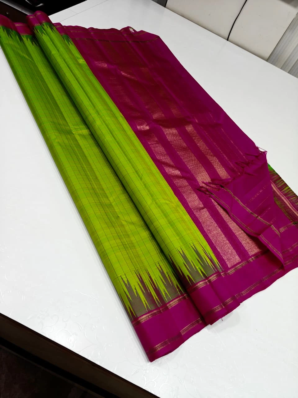 Classic Parrot Green Silk Saree with Contrast Pink Zari Border Design